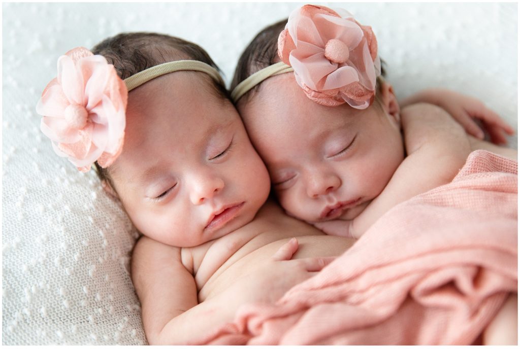 las Vegas twins cuddle in pink bows