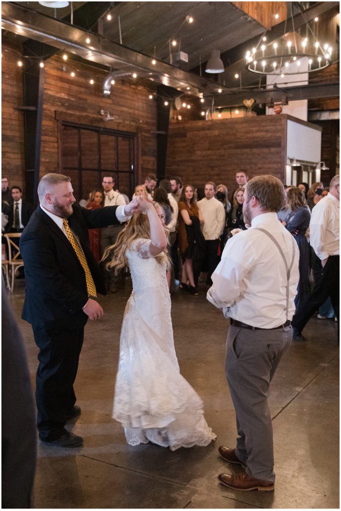 FIVE BROTHERS DANCE WITH BRIDE